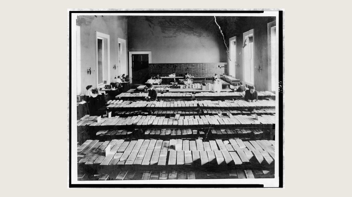People working in Card Division in the Library of Congress, Washington, D.C. Source: Wikimedia Commons {{PD-1923}}
