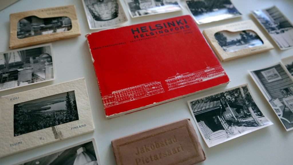 Image showing old travel guidebooks and souvenir photos