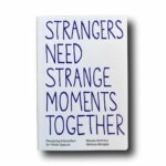 Photo showing the book Strangers Need Strange Moments Together